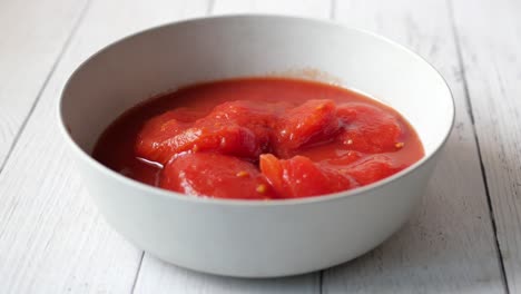 preserved caned tomato in a bowl