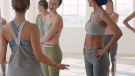 group-of-healthy-women-learning-dance-moves-enjoying-fitness-instructor-teaching-dancing-choreography-showing-routine-having-fun-in-studio