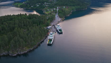 drone view of ferries at dragsvik fergeleie slip, balestrand, vestland, norway