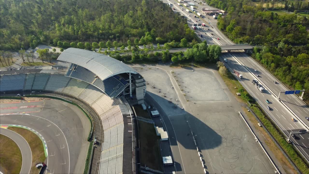 Aerial view of a racetrack and highway