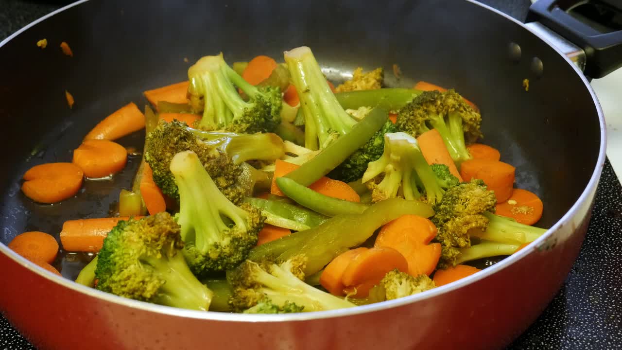Serving up freshly cooked vegetables for a healthy meal