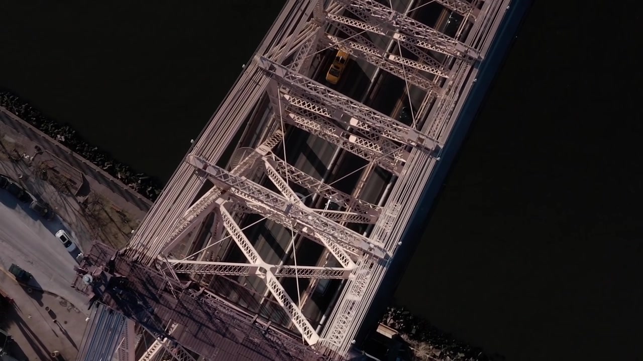 View of the Queensboro Bridge in New York City from above during the day