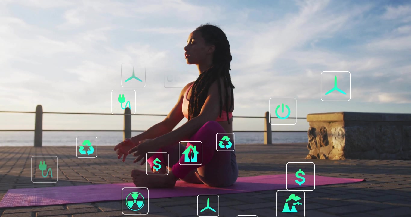 Giovane donna che pratica yoga all'aperto con icone digitali di sostenibilità