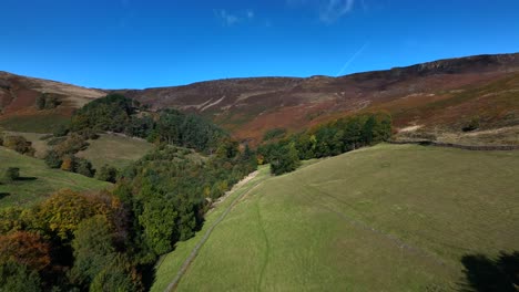 drone shot over beautiful english summer fields, trees and valleys