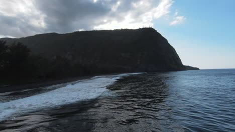 Low-high-speed-FPV-drone-flight-over-breaking-waves-towards-Hawaiian-beach