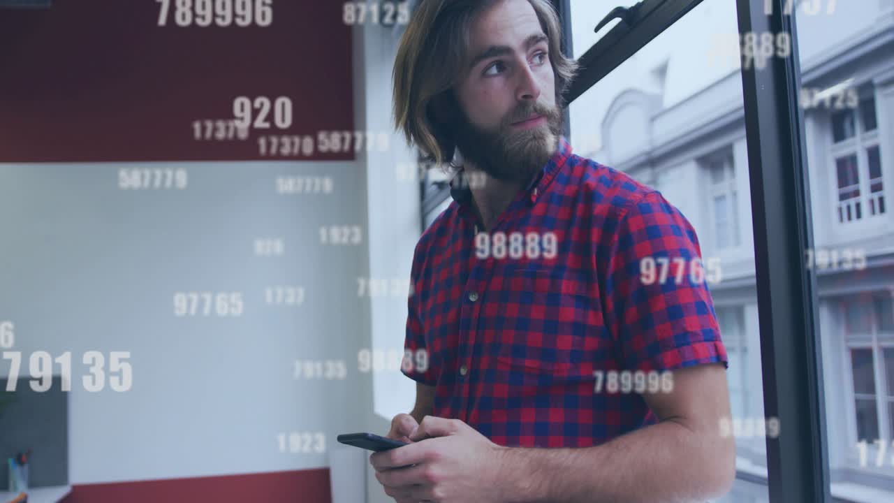 Man tapping phone by window monitoring business metrics while numeric overlay drifting across view