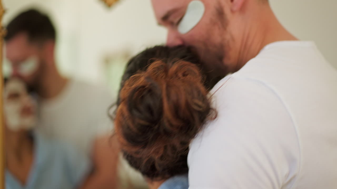 Happy couple, face mask and skin care in home