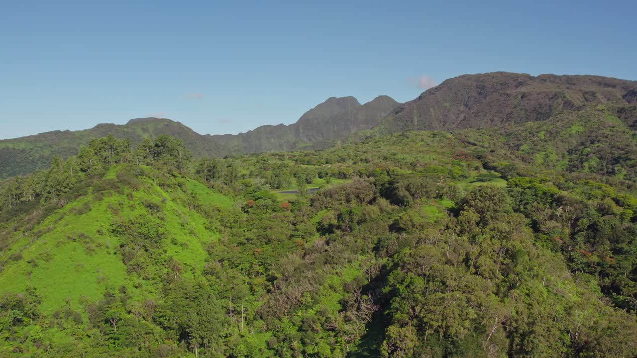 Long Aerial Drone Footage of Tahiti Island from Mountain Top with Dense Jungles and a View of the Islands from Belvedere Point
