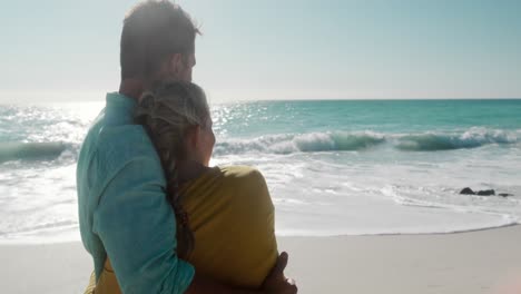 couple in love enjoying free time on the beach together