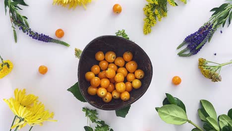 Colorful Fruit Arrangement with Flowers