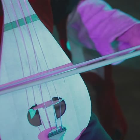 man playing old vintage lute