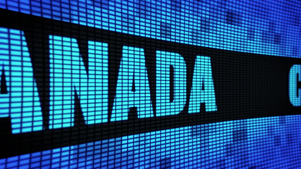 Digital display showing the words "NADA" and "CANVAS"