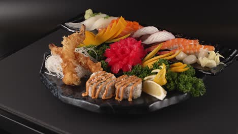 a refined platter of shrimp tempura rolls, fresh sashimi, and savory nigiri. 새우튀김 롤, 신선한 사시미, 감칠맛 나는 초밥이 조화로운 플래터.