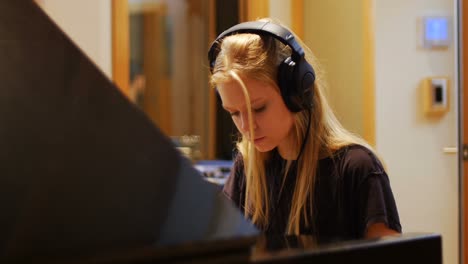 woman playing a piano