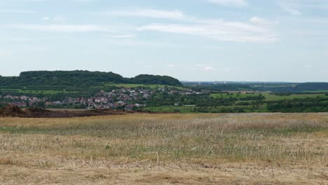 view of village from distance in moselle france district rural countryside