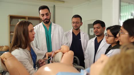 doctors teach students how to give birth using a dummy doctors teach students how to give birth using a dummy clinic