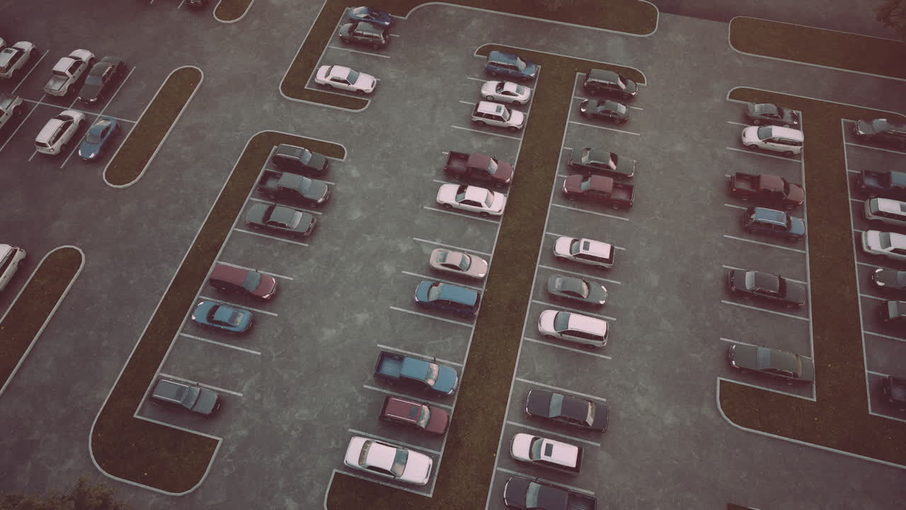 Vista aerea di un parcheggio quasi vuoto durante il giorno con auto parcheggiate