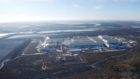 aerial view place of industrial buildings. aerial view of industrial zone and technology park on suburban area