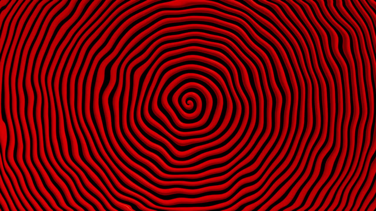 Roterende rød spiral på svart.
