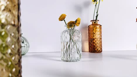 vintage glass vases with yellow flowers