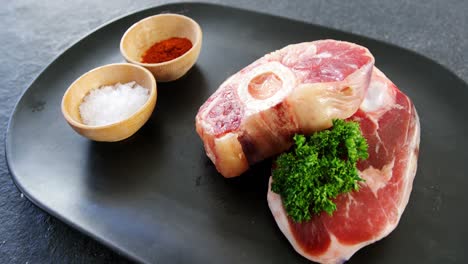 raw meat chops and ingredients