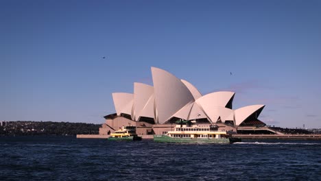 sydney opera house and ferries on sydney harbour