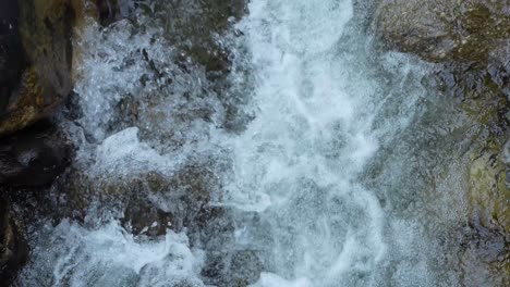 water is flowing through a mountain torrential river.
