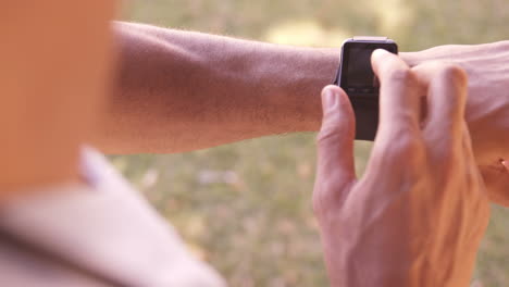 man using smart watch