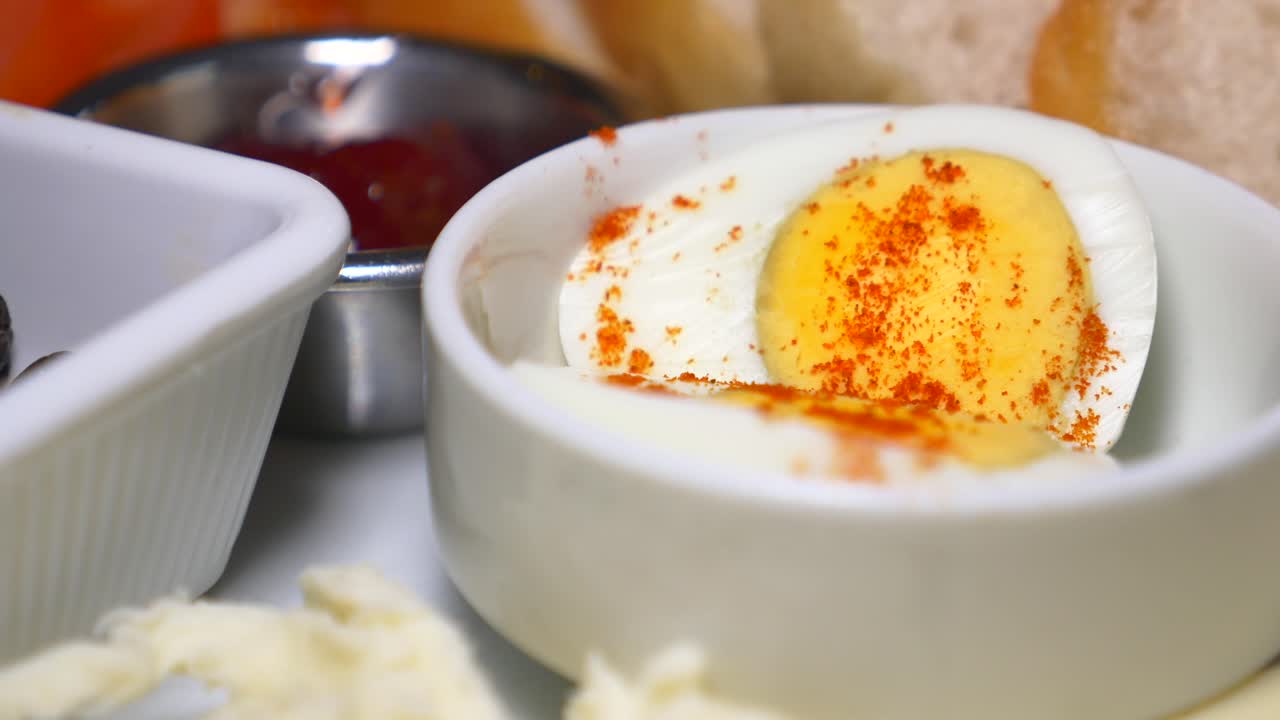 Breakfast platter with egg, bread, and cheese