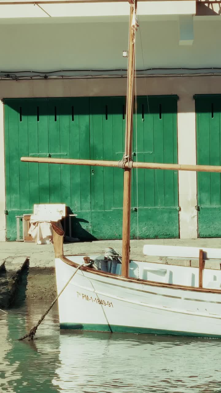 Beautiful vertical footage of boats cruising through Mallorca’s crystal-clear waters, with vibrant marinas and a charming seaside village. Perfect for travel promos and lifestyle content.