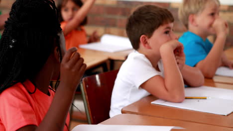 pupils listening attentively during class