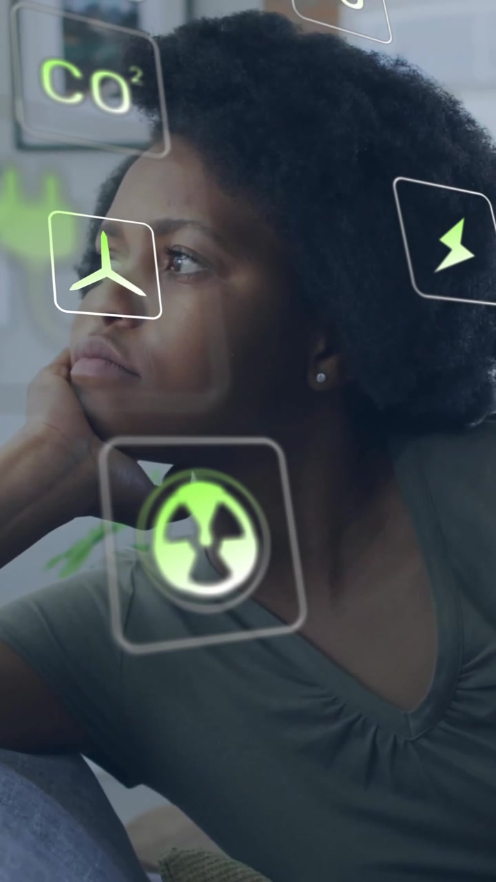 Animation of eco icons and data processing over african american woman on sofa at home