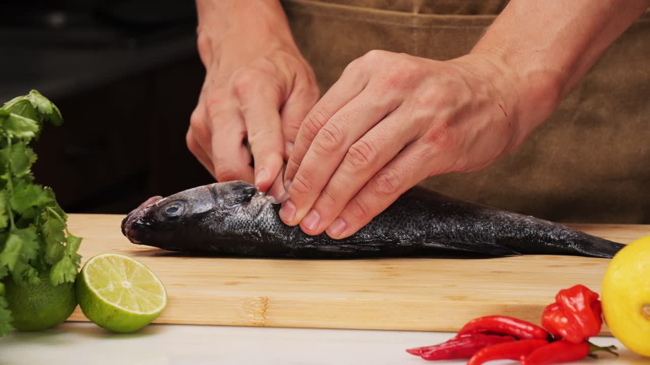 Chef preparing sea bass