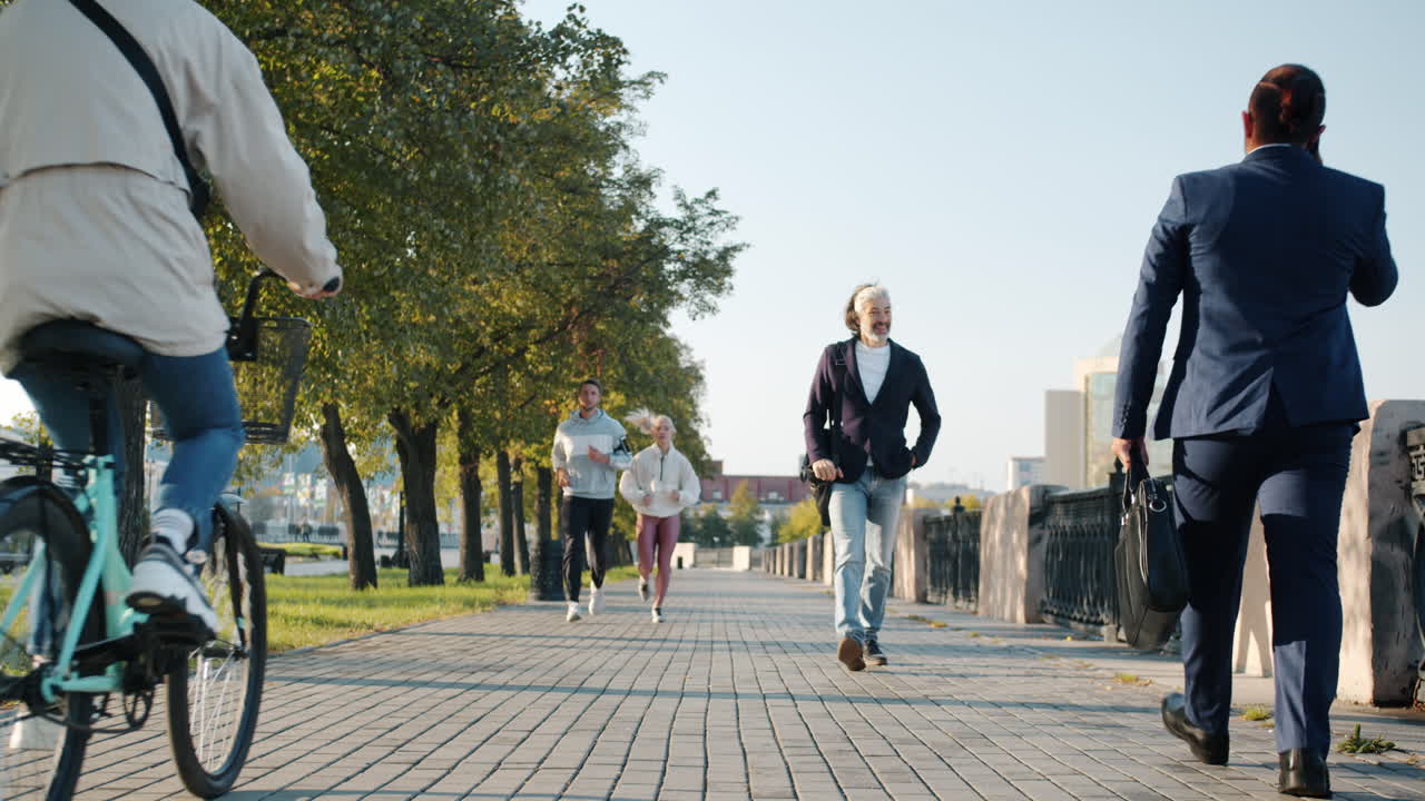 People in a city park during autumn