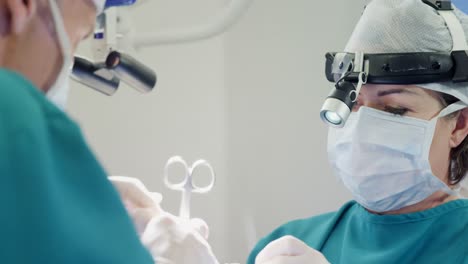 surgery team operating a patient in an operating room