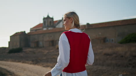 cute traveler exploring sightseeing vertical view. woman holding map navigating