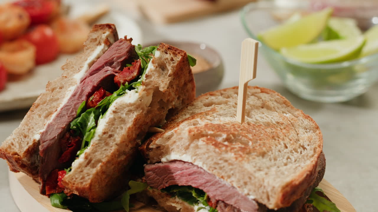Delicious Beef Sandwich with Roasted Tomatoes and Fresh Greens