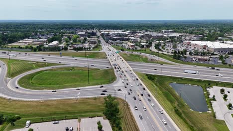 drone shot pushing in on interstate 69 in fishers, indiana