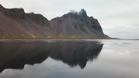 A-drone-footage-of-hofn-beach-reflecting