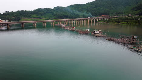 aerial view over traditional vietnamese fish farming tanks in lang co bay