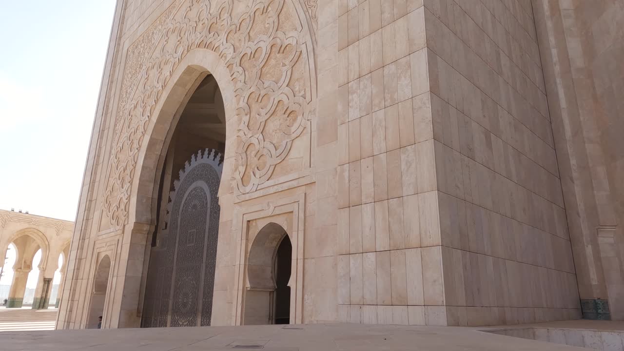 Outside View Of Casablanca Hassan II Mosque Ornate Walls With Mosaic Design