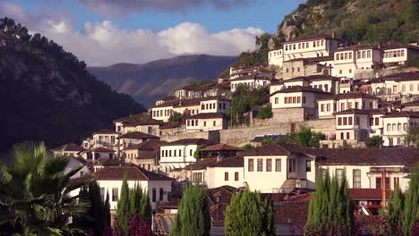 beautiful establishing shot of ancient houses on hillside in berat albania 1