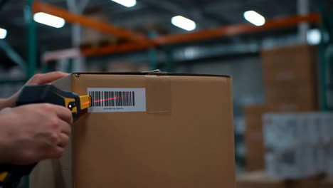 scanning a barcode on a package in a warehouse