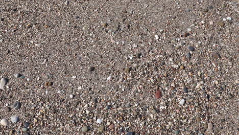 Sea-Waves-In-Beach-Sand