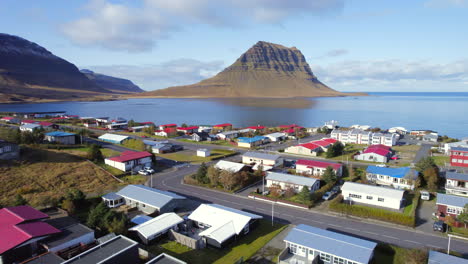 grundarfjörður town and kirkjufell mount in iceland at sunny day