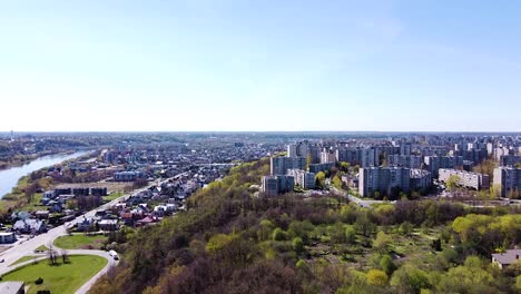 Urban-cityscape-of-Kaunas-district,-aerial-fly-forward-view