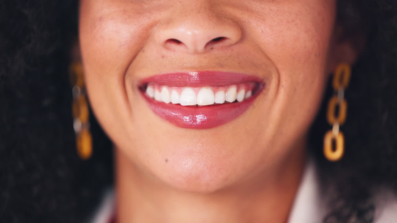 Oral hygiene closeup of a woman smiling