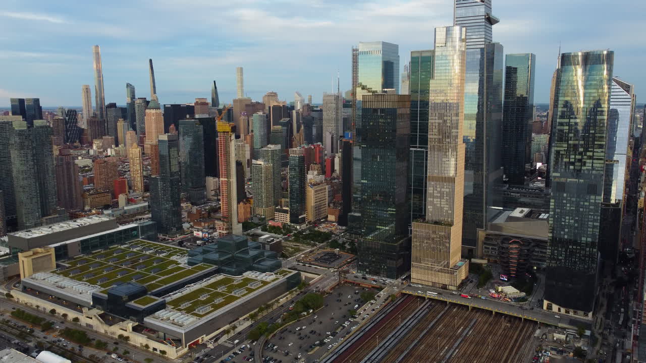 Establishing drone shot away from the Hudson Yards skyline, golden hour in NYC