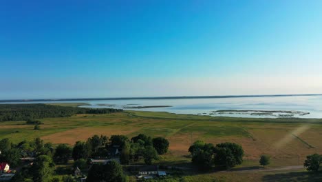 stunning view of water and fields of slovansky slowinski national park near gdansk gdynia, poland, copy space and slow motion