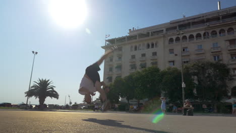 two guys doing extreme tricks on the square